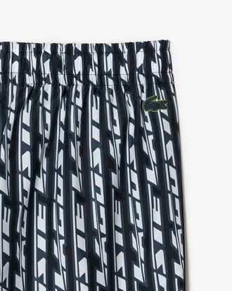 Cal&ccedil;a esportiva feminina Lacoste com estampa de logo
