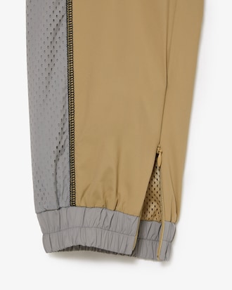 Cal&ccedil;a esportiva feminina Lacoste com efeito perfurado