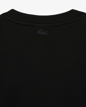 Camiseta masculina Lacoste x Netflix em algodão orgânico