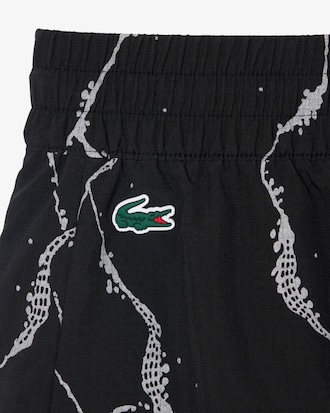 Shorts de tenis forrado con estampado reflect