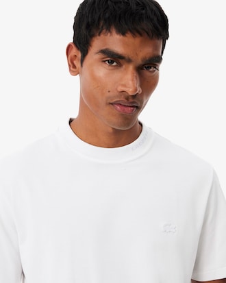 Camiseta piqu&eacute; com marca de jacquard