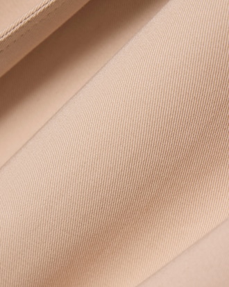 Gabardina oversized hidr&oacute;fuga