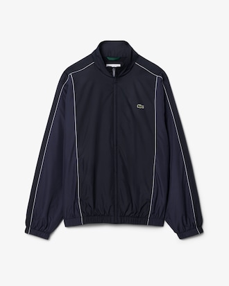 Campera  de ch&aacute;ndal hidr&oacute;fuga con bloques de color