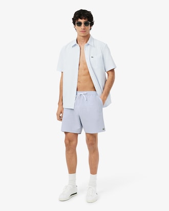 Sunga bermuda listrada de comprimento m&eacute;dio com textura
