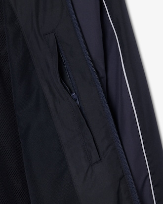 Campera  de ch&aacute;ndal hidr&oacute;fuga con bloques de color