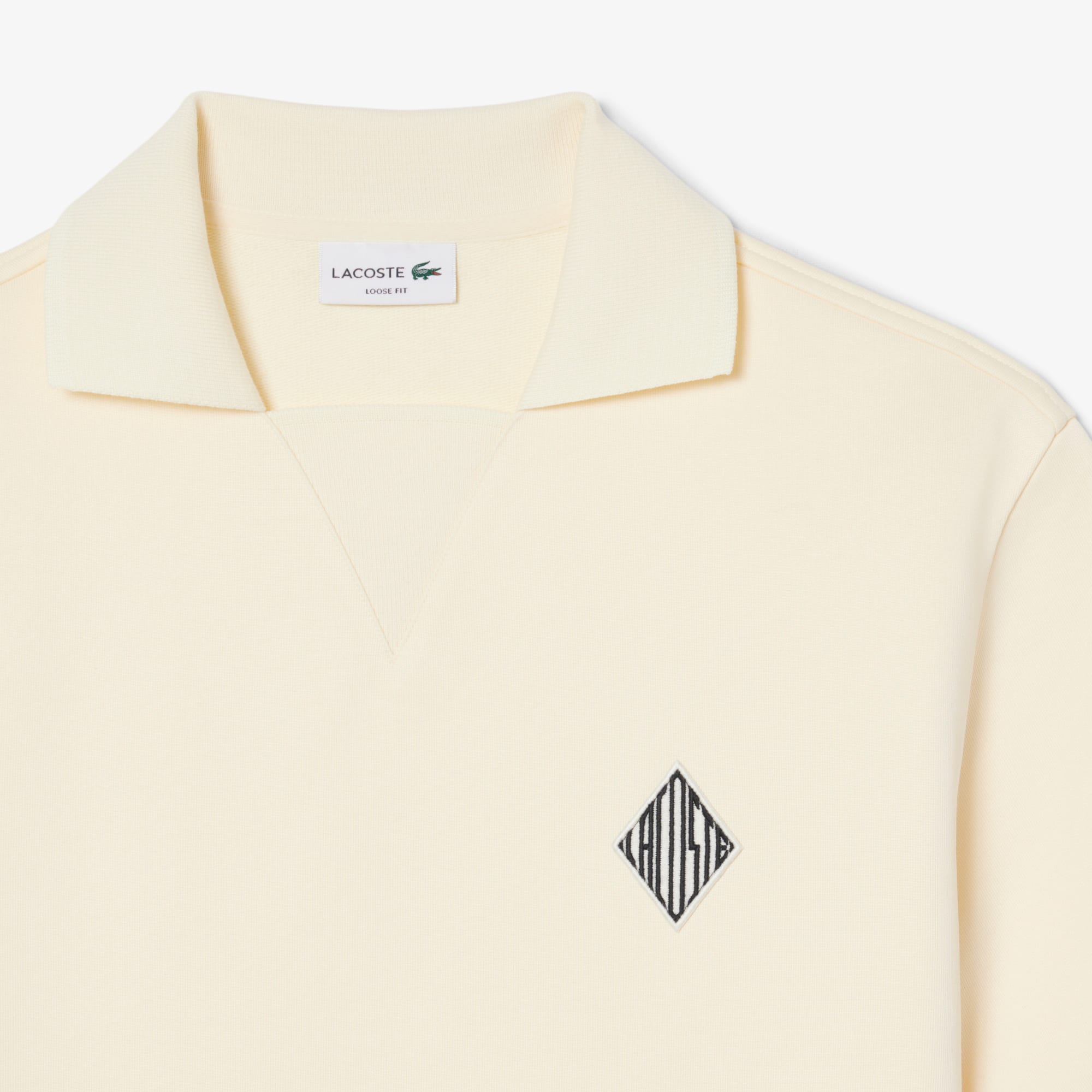 Polo em Moletom com aplique bordado - Corte solto