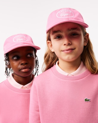 Bon&eacute; infantil ajust&aacute;vel com ilhoses contrastantes