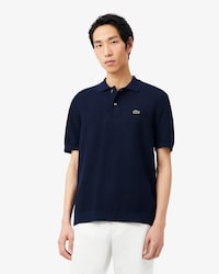 Polo em malha de caimento cl&aacute;ssico