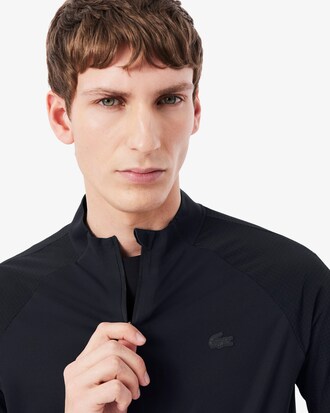 Buzo deportiva con cremallera en tejido el&aacute;stico UltraDry