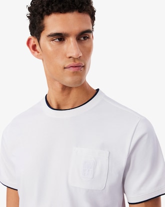 Camiseta Ultra Dry Tennis Heritage com Ins&iacute;gnia