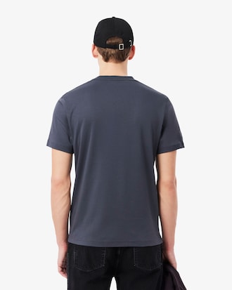 Remera con Firma Bordada