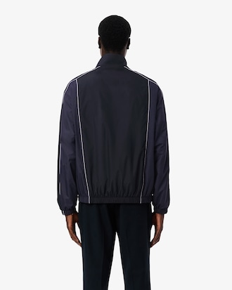 Campera  de ch&aacute;ndal hidr&oacute;fuga con bloques de color