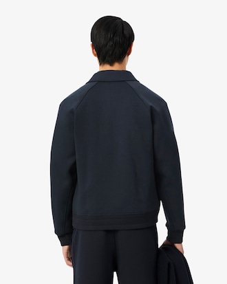 Campera de ch&aacute;ndal con insignia retro de fabricaci&oacute;n francesa