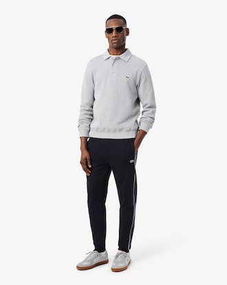 Cal&ccedil;a esportiva com perna afunilada