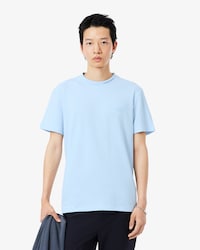 Remera de piqu&eacute; con detalles de marca de jacquard