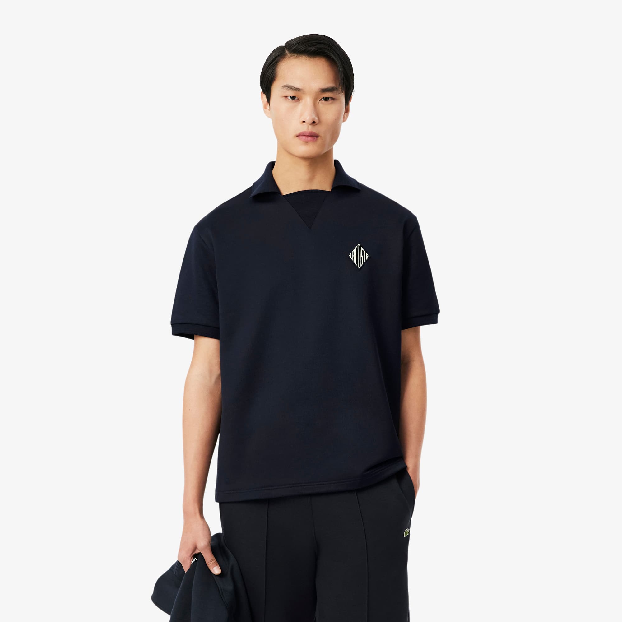 Polo em Moletom com aplique bordado - Corte solto