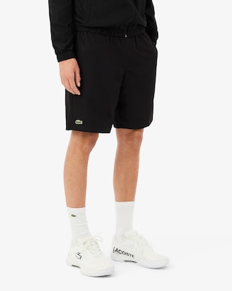 Short de t&ecirc;nis de tafet&aacute; diamante leve