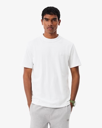 Camiseta piqu&eacute; com marca de jacquard