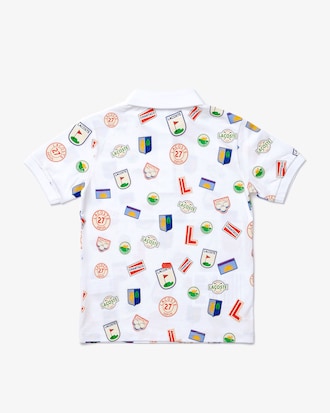 Polo infantil Lacoste em piqu&eacute; de algod&atilde;o com emblemas estampados