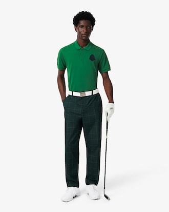 Polo de golf de piqu&eacute; mini con insignia y el&aacute;stico