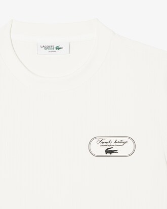 Camiseta Ultra Dry com emblema de t&ecirc;nis Heritage