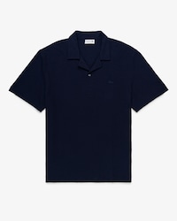 Polo de corte cl&aacute;sico texturizado