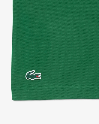 Polo de golf de piqu&eacute; mini con insignia y el&aacute;stico