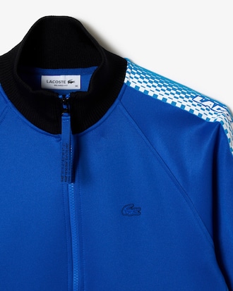 Moletom feminino com modelagem solta, z&iacute;per e listra com logo