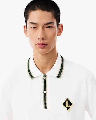 Camisa Polo Cl&aacute;ssica com Detalhe de Emblema Feita na Fran&ccedil;a