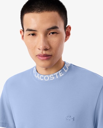 Remera De Piqu&eacute; Y Emblema En Jacquard