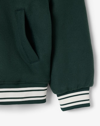 Campera tipo bomber con insignia de cocodrilo