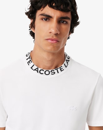 Remera De Piqu&eacute; Y Emblema En Jacquard