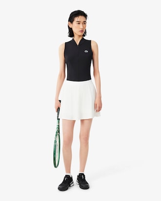 Polo de tenis sin mangas de doble tejido el&aacute;stico