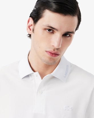 Polo de piqu&eacute; de corte ajustado con detalles de marca de jacquard