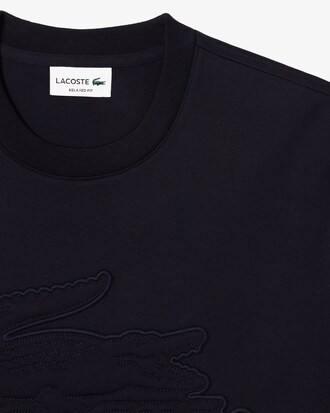 Camiseta Relaxed Fit em j&eacute;rsei com emblema acolchoado