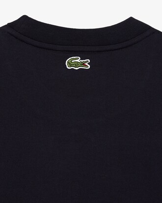 Camiseta Relaxed Fit em j&eacute;rsei com emblema acolchoado