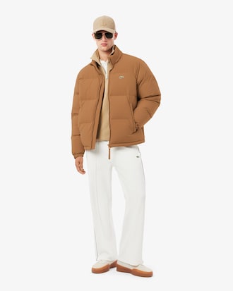 Campera de plum&oacute;n con capucha y repelente al agua