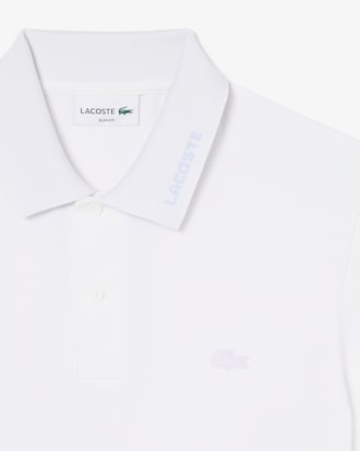 Polo de piqu&eacute; de corte ajustado con detalles de marca de jacquard