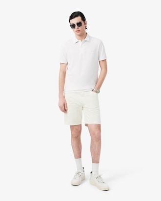 Polo de piqu&eacute; de corte ajustado con detalles de marca de jacquard