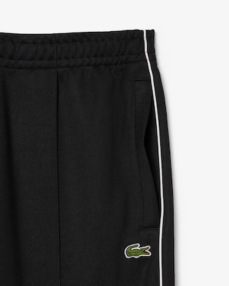 Cal&ccedil;a esportiva em piqu&eacute; com detalhes contrastantes