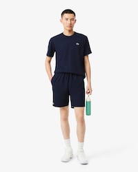 Short de t&ecirc;nis de tafet&aacute; diamante leve