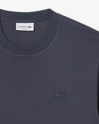 Remera con Firma Bordada