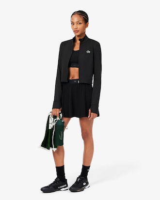 Campera deportiva intermedia de tenis el&aacute;stica con doble tejido y cierre
