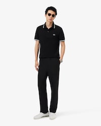 Pantal&oacute;n chino de punto de corte regular
