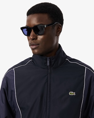 Campera  de ch&aacute;ndal hidr&oacute;fuga con bloques de color