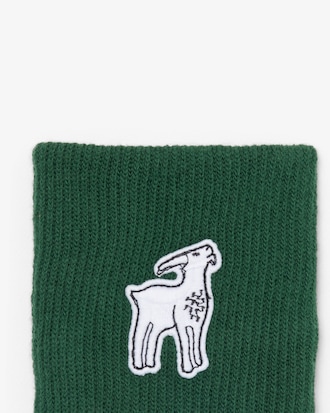 Munhequeiras GOAT Lacoste x Novak Djokovic