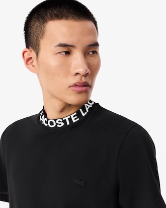 Remera De Piqué Y Emblema En Jacquard