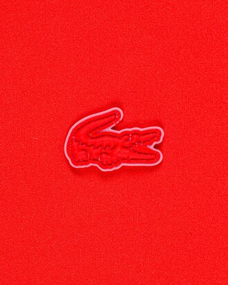 Polo curta feminina Lacoste em poliamida reciclada com mangas longas