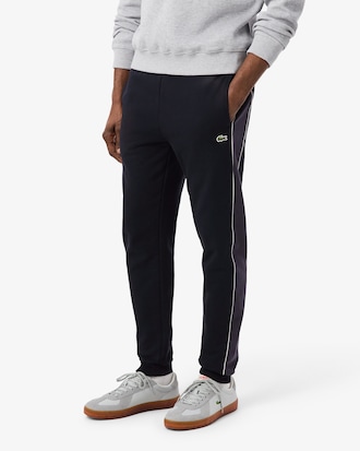 Cal&ccedil;a esportiva com perna afunilada