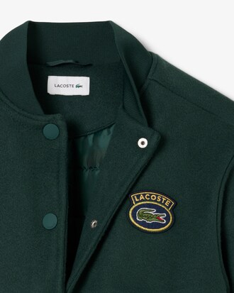 Campera tipo bomber con insignia de cocodrilo